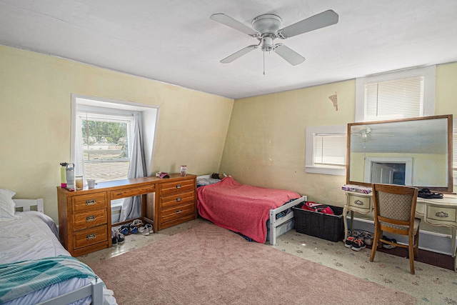 carpeted bedroom featuring ceiling fan