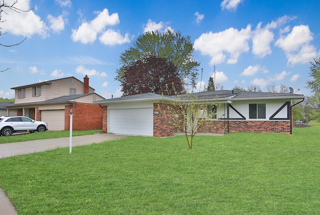 view of front of house featuring brick siding, an attached garage, driveway, and a front yard
