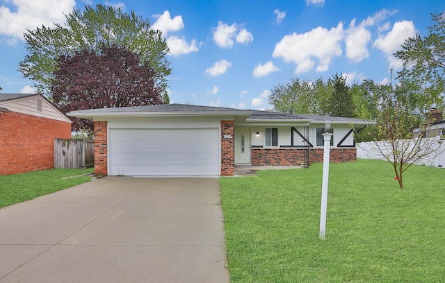 view of front of house featuring driveway, a garage, and brick siding