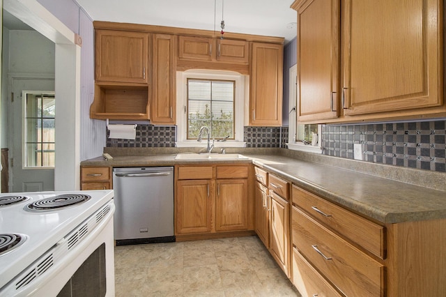 kitchen featuring a wealth of natural light, white range with electric cooktop, a sink, and dishwasher