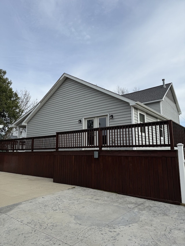 4212 4th St, Brown City, MI 48416 - view of home's exterior with a wooden deck and a shingled roof
