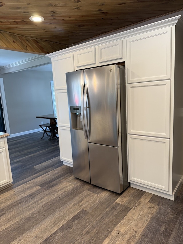 4212 4th St, Brown City, MI 48416 - kitchen featuring white cabinets, stainless steel fridge, baseboards, and dark wood-type flooring