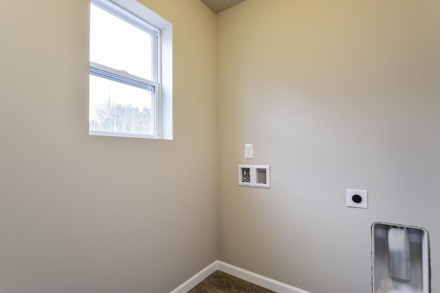 laundry area with laundry area, hookup for an electric dryer, dark wood finished floors, baseboards, and hookup for a washing machine