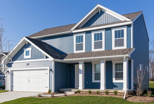 view of front of home featuring board and batten siding, a porch, and roof with shingles