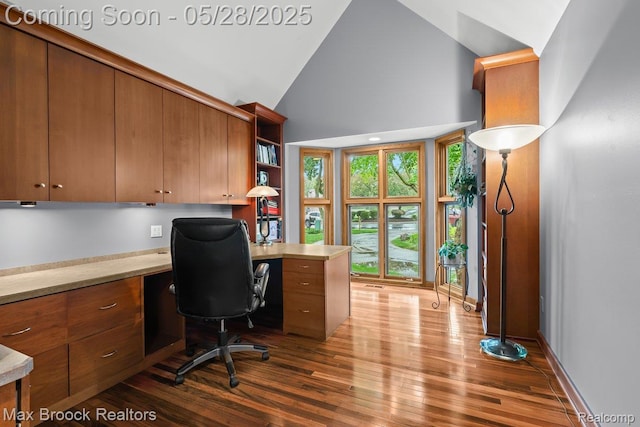 4395 Hickory Ct, Orchard Lake, MI 48323 - office area with built in study area, dark wood-type flooring, and high vaulted ceiling