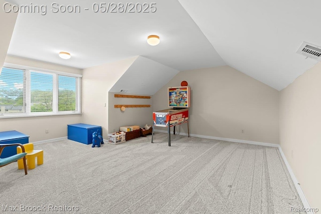 4395 Hickory Ct, Orchard Lake, MI 48323 - bonus room featuring carpet floors, lofted ceiling, and baseboards
