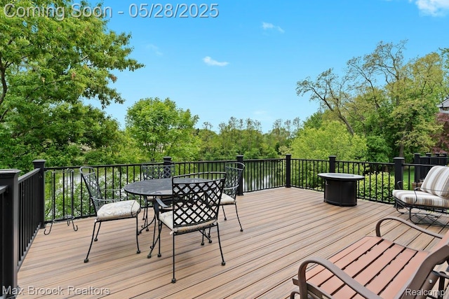 4395 Hickory Ct, Orchard Lake, MI 48323 - wooden deck with outdoor dining space