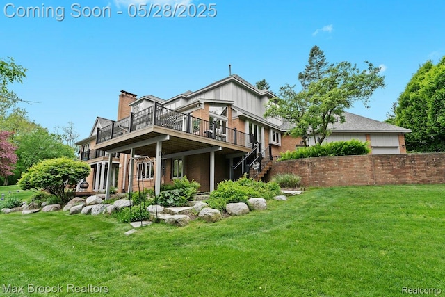 4395 Hickory Ct, Orchard Lake, MI 48323 - rear view of house featuring a wooden deck, a lawn, and a chimney