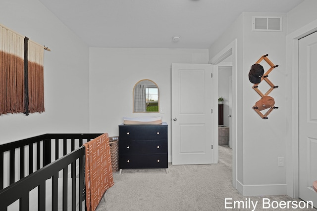 bedroom featuring carpet and visible vents
