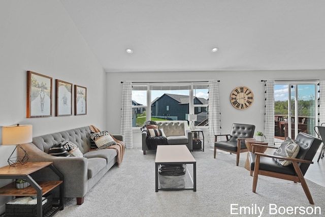 living area featuring recessed lighting and carpet floors