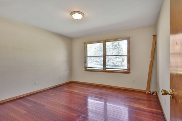 53201 Maranatha Ln, Wixom, MI 48393 - unfurnished room featuring hardwood / wood-style flooring and baseboards