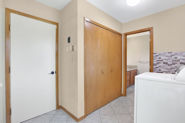 53201 Maranatha Ln, Wixom, MI 48393 - laundry room with washer / clothes dryer and light tile patterned floors