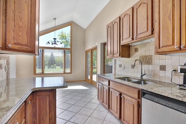 53201 Maranatha Ln, Wixom, MI 48393 - kitchen featuring dishwasher, a sink, healthy amount of natural light, light tile patterned floors, and high vaulted ceiling