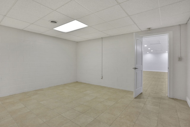 53201 Maranatha Ln, Wixom, MI 48393 - basement with a paneled ceiling and light tile patterned floors
