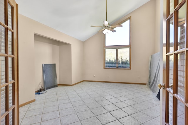 53201 Maranatha Ln, Wixom, MI 48393 - unfurnished room featuring light tile patterned floors, a ceiling fan, baseboards, and high vaulted ceiling