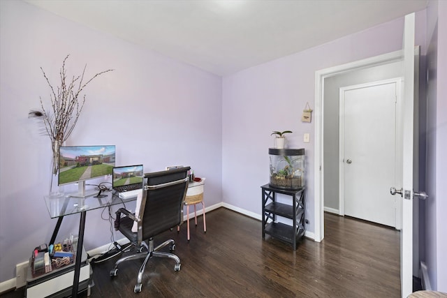 home office with wood finished floors and baseboards
