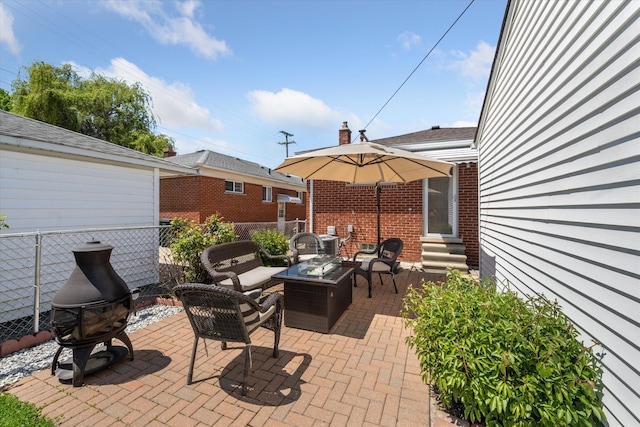 view of patio / terrace featuring entry steps, fence, and an outdoor hangout area