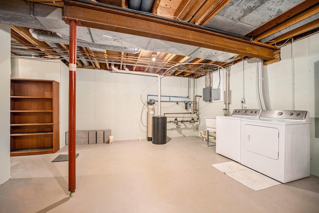 unfinished basement with washing machine and dryer