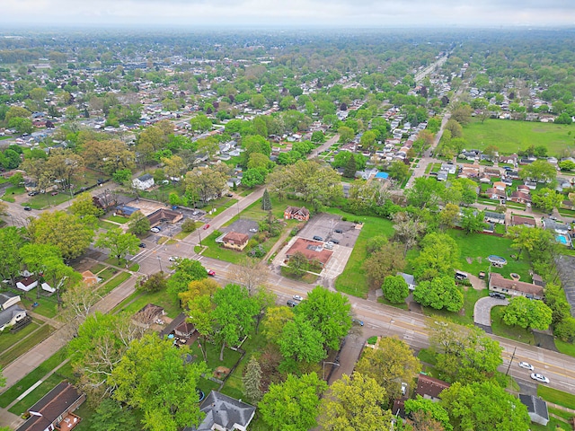 aerial view of property's location featuring nearby suburban area