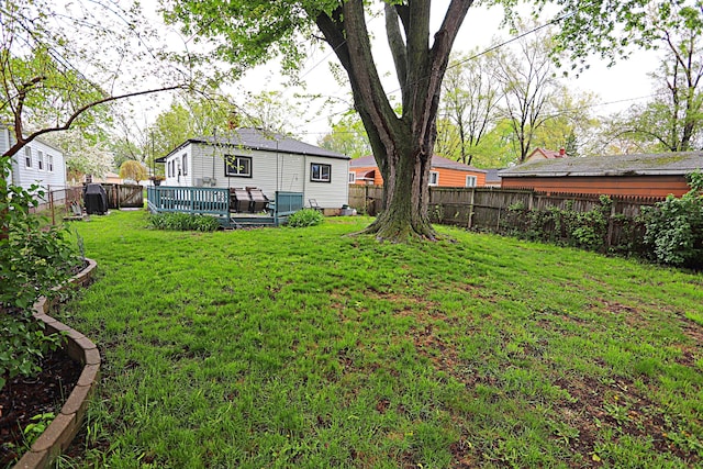 view of yard with a deck