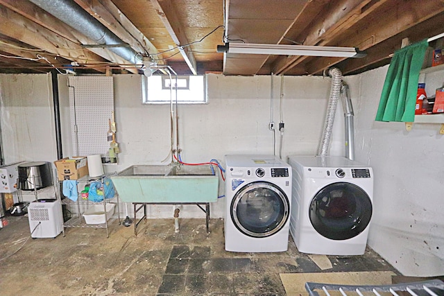 laundry room with washer and clothes dryer