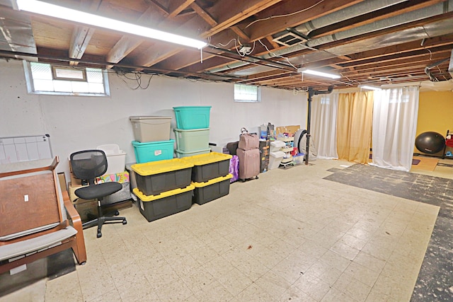 below grade area featuring tile patterned floors
