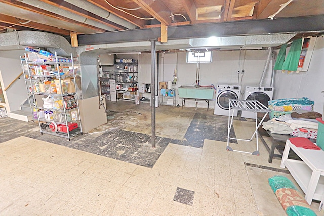 below grade area featuring independent washer and dryer