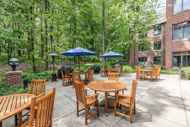 view of patio featuring outdoor dining space