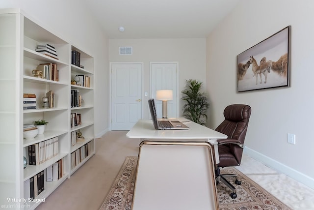 office area featuring baseboards and visible vents