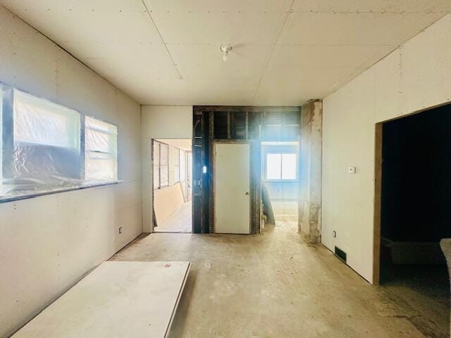 505 Ramsdell St, Manistee, MI 49660 - unfurnished room featuring concrete flooring