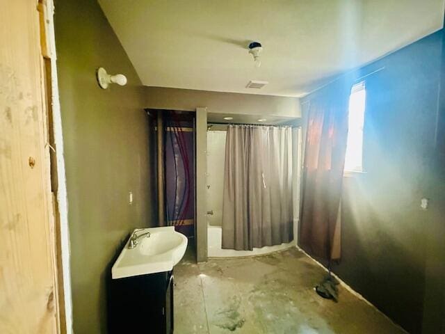 505 Ramsdell St, Manistee, MI 49660 - bathroom with vanity and shower / bathtub combination with curtain