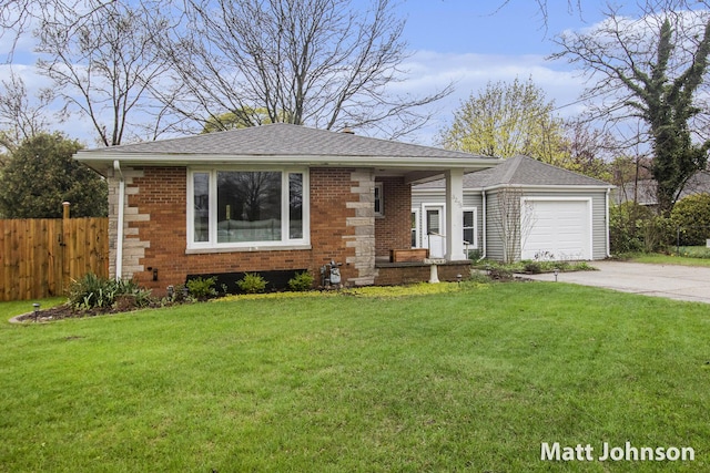 ranch-style house with an attached garage, fence, a front lawn, brick siding, and driveway