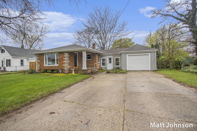ranch-style home featuring concrete driveway, a garage, brick siding, and a front yard
