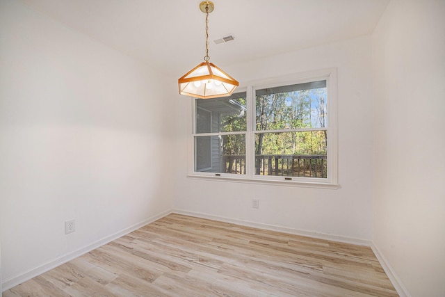 44811 Paw Paw Rd, Paw Paw, MI 49079 - unfurnished room featuring light wood-style flooring, baseboards, and visible vents