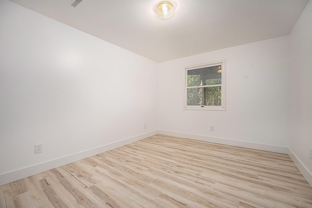 44811 Paw Paw Rd, Paw Paw, MI 49079 - spare room with light wood-style flooring and baseboards