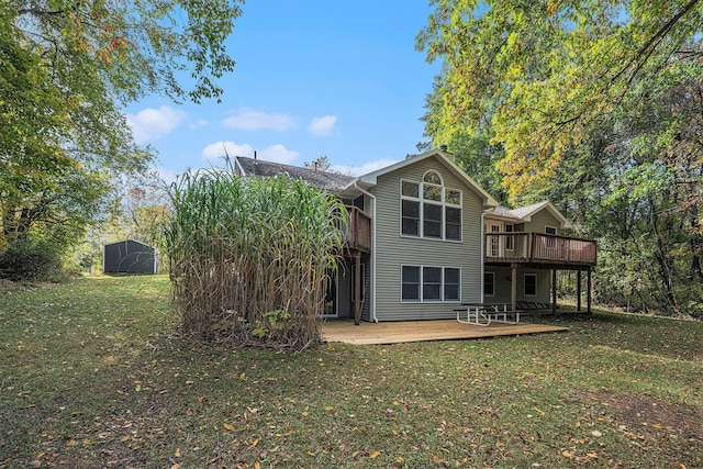 44811 Paw Paw Rd, Paw Paw, MI 49079 - rear view of property with a yard, an outdoor structure, a patio area, a deck, and a storage unit