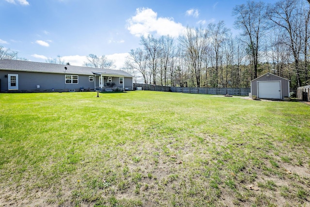 9379 Cook St, Montague, MI 49437 - view of yard with a garage and an outdoor structure
