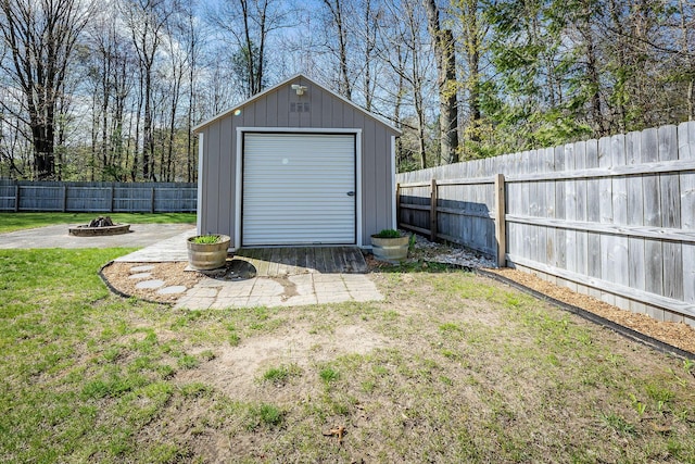 9379 Cook St, Montague, MI 49437 - view of shed with a fire pit