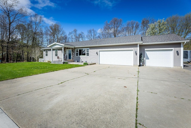9379 Cook St, Montague, MI 49437 - single story home with an attached garage, driveway, and a front yard