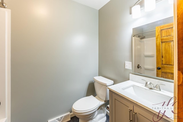 9379 Cook St, Montague, MI 49437 - bathroom featuring toilet and vanity