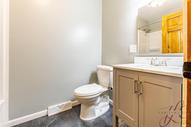 9379 Cook St, Montague, MI 49437 - bathroom featuring vanity, toilet, baseboards, a shower, and wood finished floors