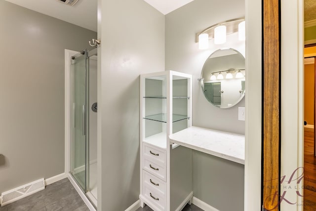 9379 Cook St, Montague, MI 49437 - full bath featuring a shower stall, vanity, and baseboards