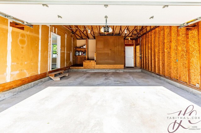 9379 Cook St, Montague, MI 49437 - garage with a garage door opener