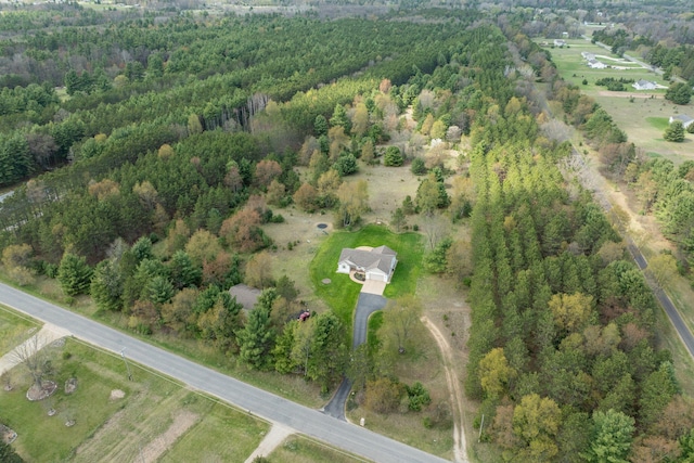 aerial view featuring a forest view