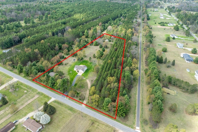 aerial view featuring a rural view and a forest view