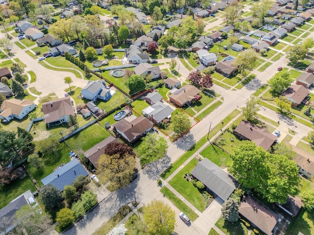 aerial view of property's location with nearby suburban area