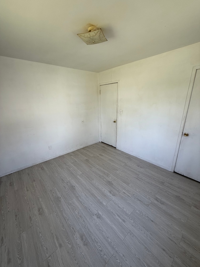 1710 Polly St, Flint, MI 48505 - empty room featuring wood finished floors