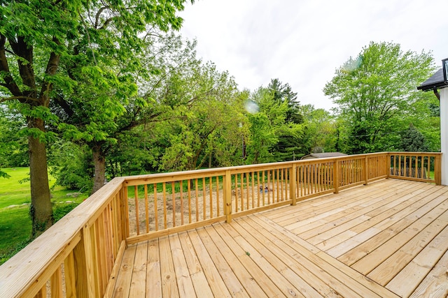 26015 E Huron River Dr, Flat Rock, MI 48134 - wooden deck with view of scattered trees
