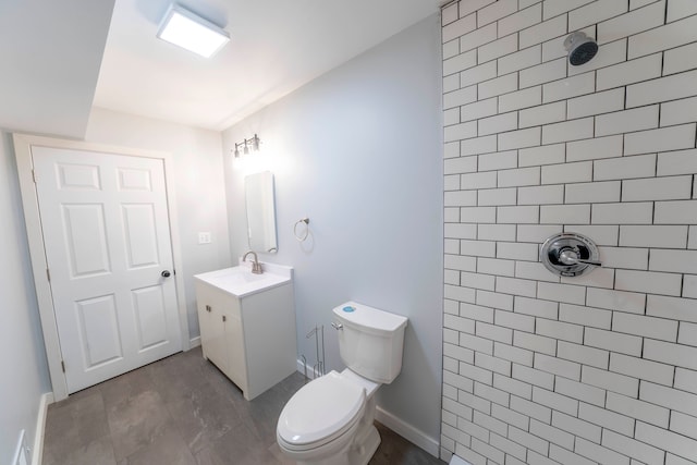26015 E Huron River Dr, Flat Rock, MI 48134 - full bath featuring a tile shower, vanity, toilet, and baseboards