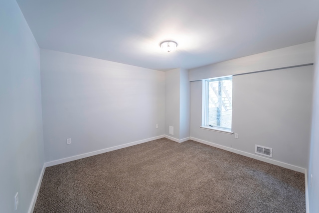 26015 E Huron River Dr, Flat Rock, MI 48134 - carpeted empty room with baseboards